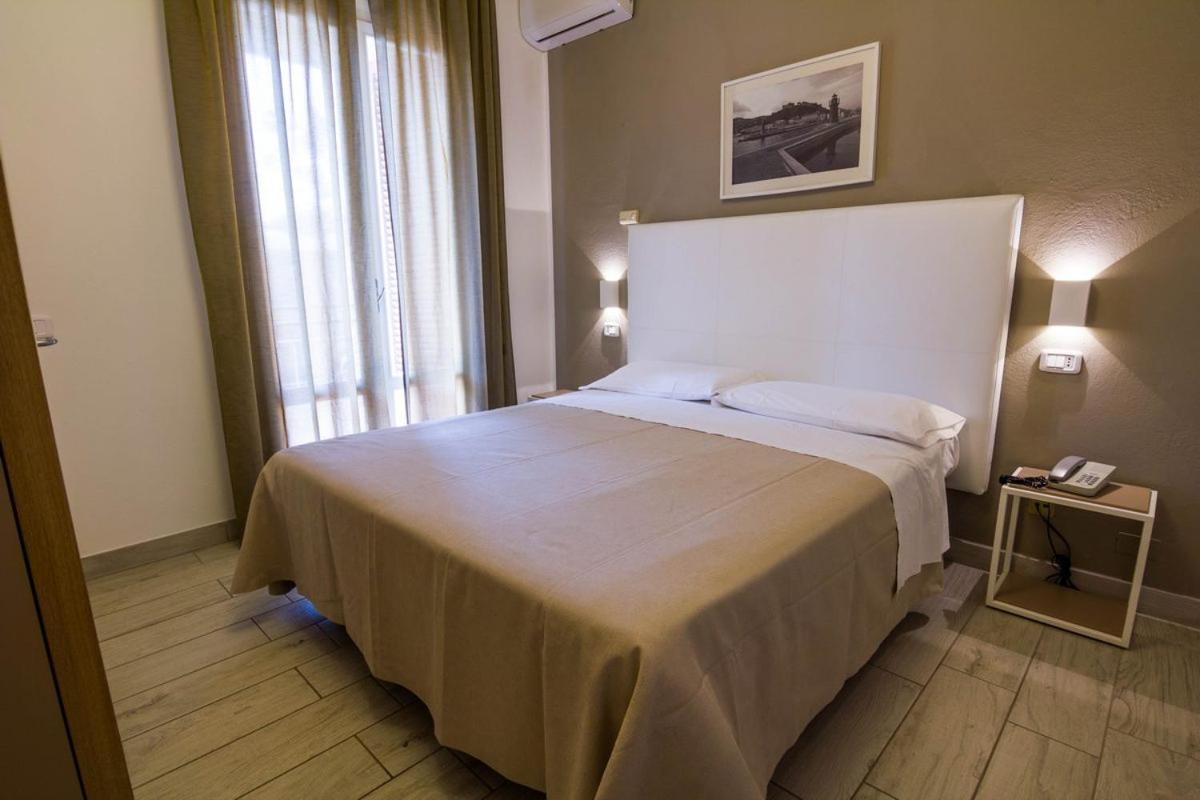 Hotel Mirella Castiglione della Pescaia Pokoj fotografie